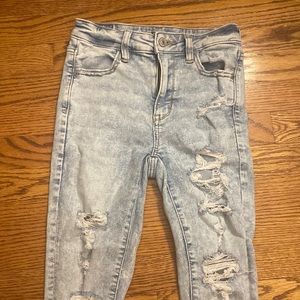 light wash american eagle ripped skinny jeans